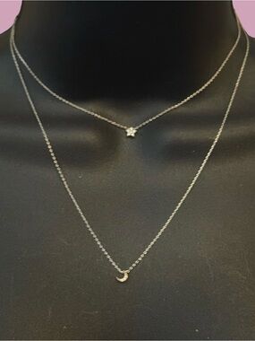 Dainty silver tone layered celestial star and moon necklace